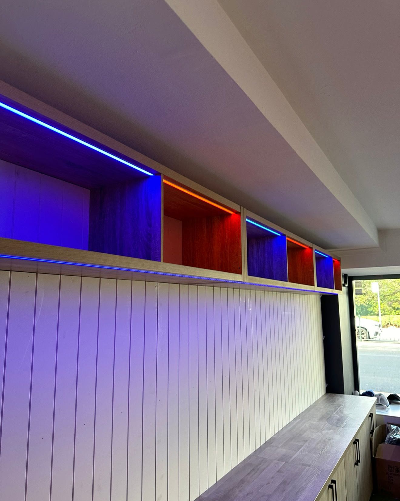 Colour-changing LED feature lighting built into custom joinery