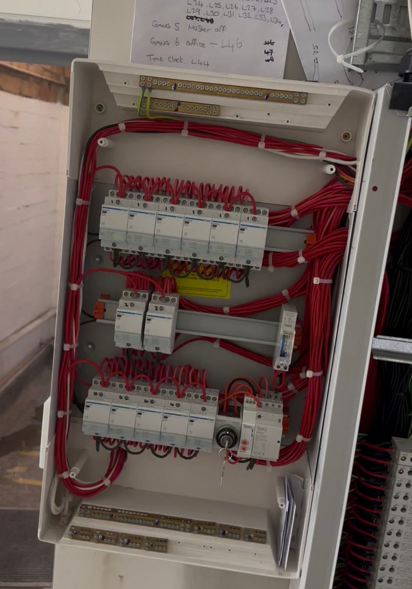 Switchboard being wired with new circuit breakers and cabling