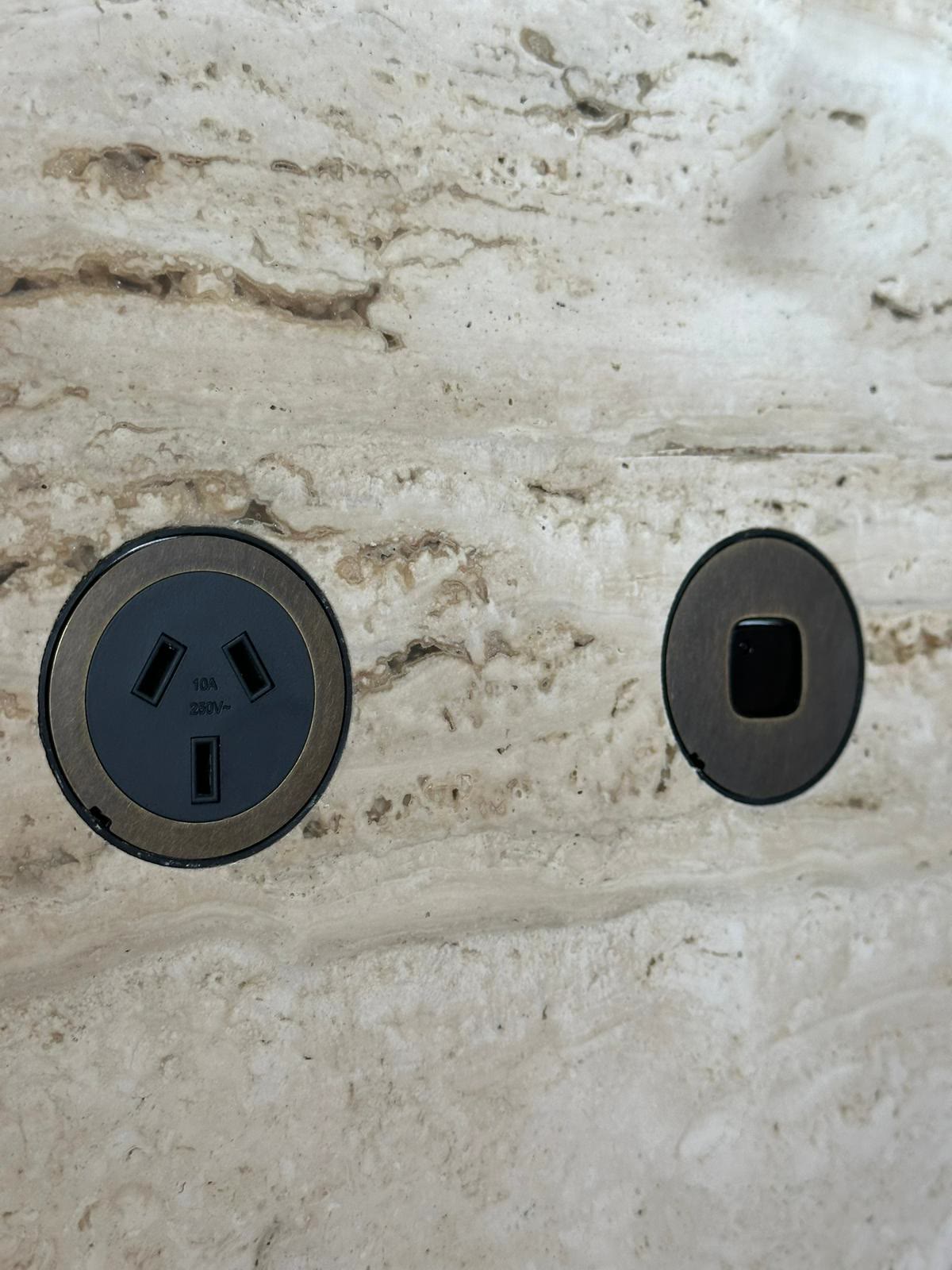 Power point installed on a stone feature wall