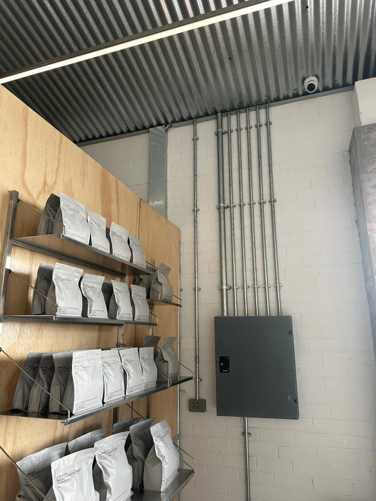 Warehouse racking with conduit and distribution